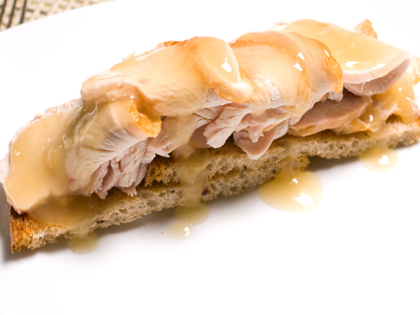 A hot turkey melt like the one pictured here is one of the most obvious healthy ways to use up leftover turkey.